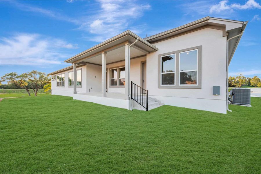 Representative exterior details of a home built from the The Mcclure by David Weekley Homes in Leander Estates, Leander (Image 3).