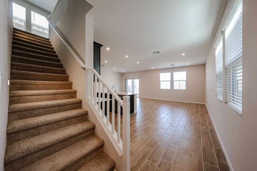 A staircase in a house. A staircase in a house.