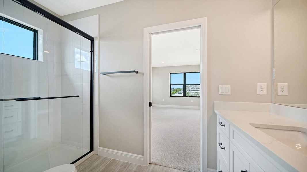 Furnished interior view inside a new home in Windward Real Estate and Homes for Sale in Sarasota, FL - Neal Communities, Lakewood Ranch (Image 31).