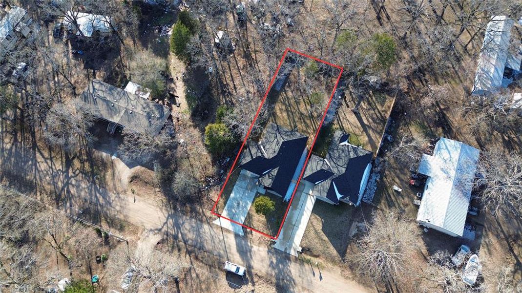 Aerial view of property's location featuring property parcel outlined