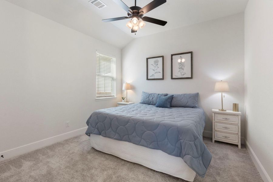 This guest bedroom is complete with it's very own en-suite bathroom.