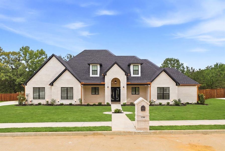Front exterior of a new home in , Longview, TX, highlighting curb appeal (Image 1). Front exterior of a new home in , Longview, TX, highlighting curb appeal (Image 1).