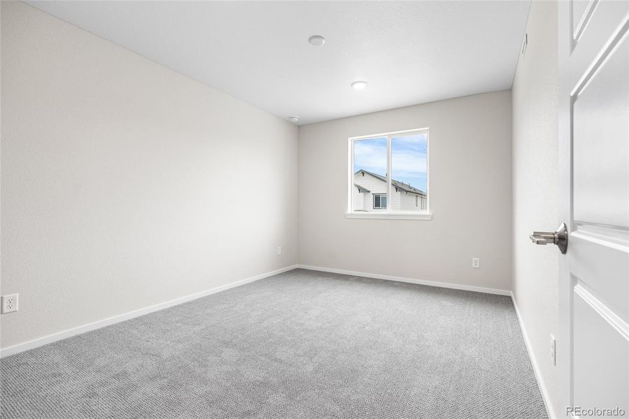 Spacious, unfurnished interior of a new home in Barefoot Village, Firestone (Image 27).