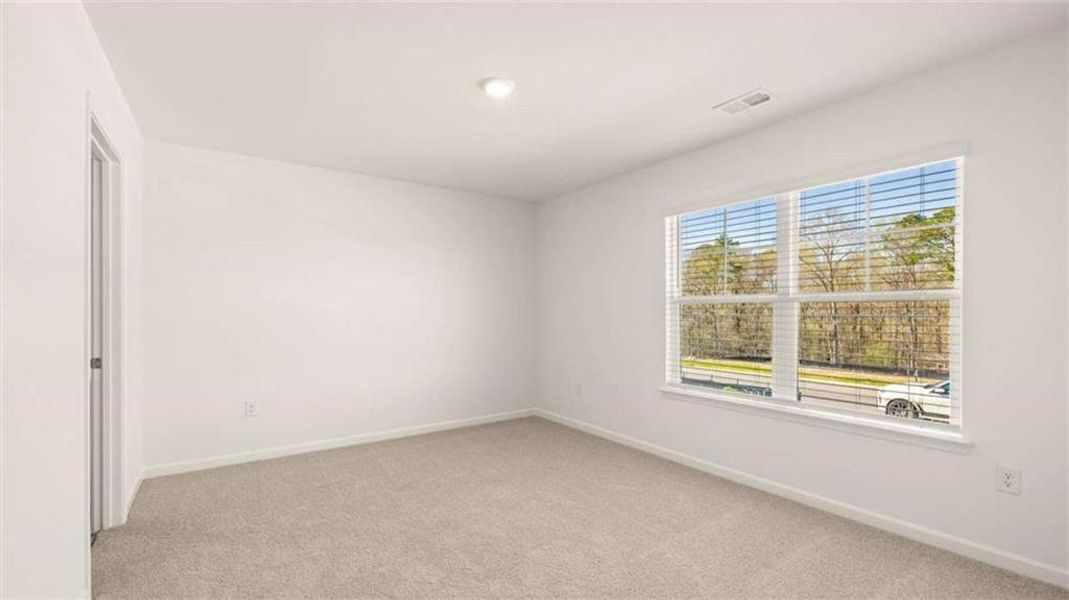 Spacious, unfurnished interior of a new home in Brooks Station, Dacula (Image 12).