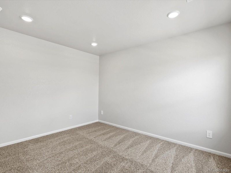 Spacious, unfurnished interior of a new home in Ridgeline Vista: The Canyon Collection, Brighton (Image 24).