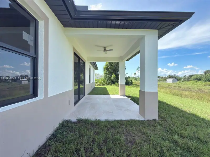Exterior details and patio area of a home in , Lehigh Acres (Image 4).