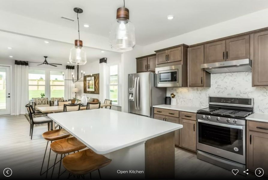 Interior photos- Photo of Pulte model home with same floor plan, not of actual home listed.