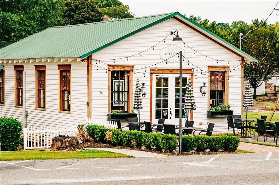 Front exterior of a new home in Rosewood Lake Estates, Hoschton, GA, highlighting curb appeal (Image 23).