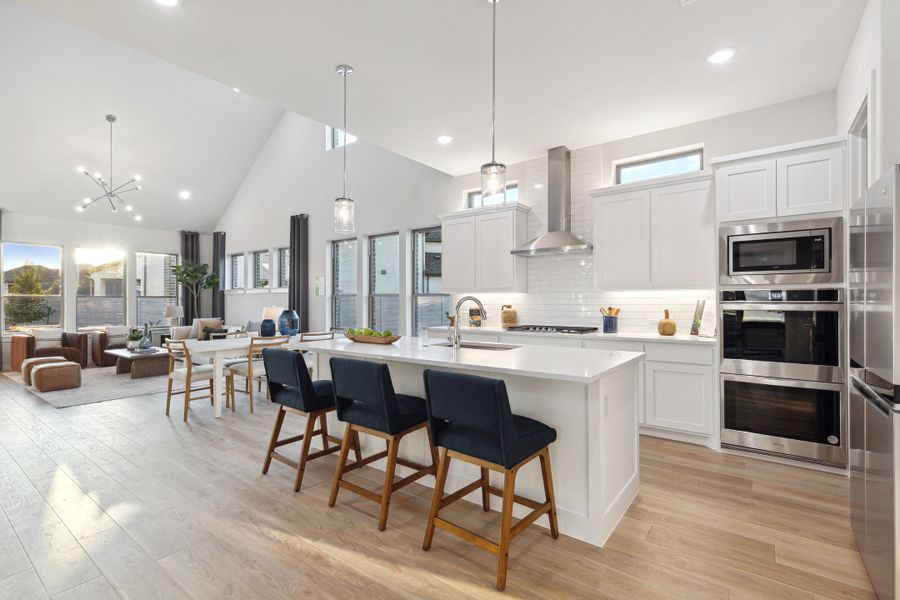 Kitchen in the Monet II home plan by Trophy Signature Homes – REPRESENTATIVE PHOTO