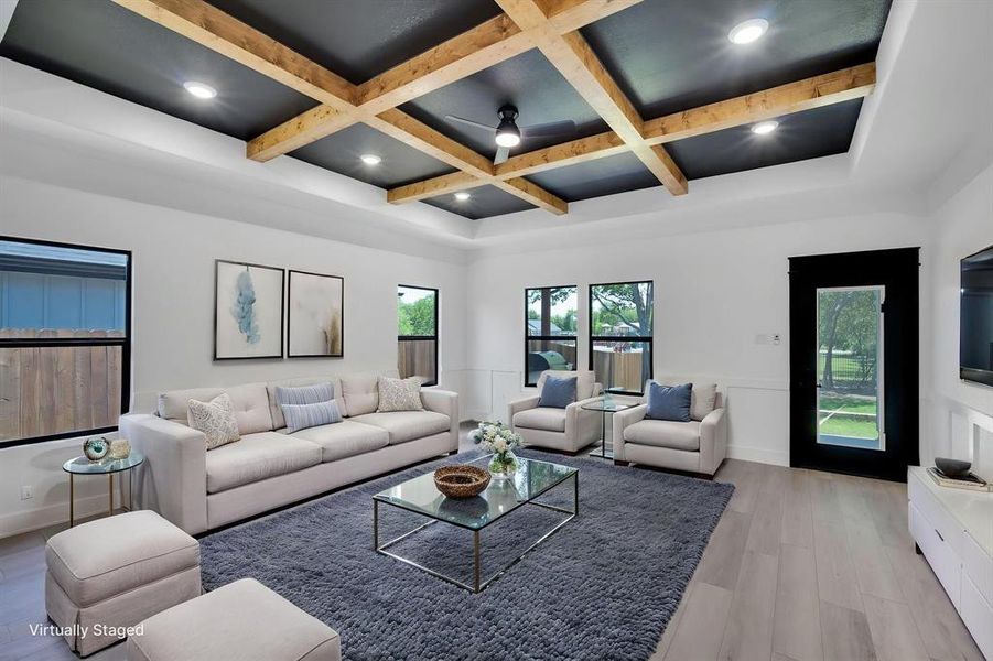 Family living room.  Check out this dramatic coffered ceiling with wood beams!