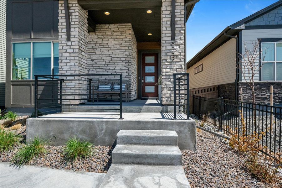 Front exterior of a new home in Painted Prairie, Aurora, CO, highlighting curb appeal (Image 22). Front exterior of a new home in Painted Prairie, Aurora, CO, highlighting curb appeal (Image 22).