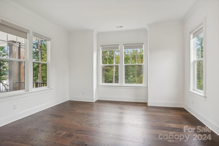 Large Primary Bedroom with lake views.