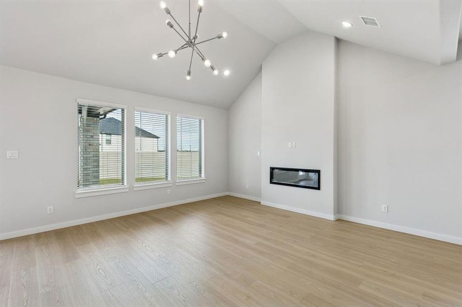 Living Room in the Stanley II home plan by Trophy Signature Homes – REPRESENTATIVE PHOTO