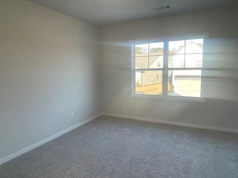 Spacious, unfurnished interior of a new home in Ponderosa Farms Estates, Gainesville (Image 25).