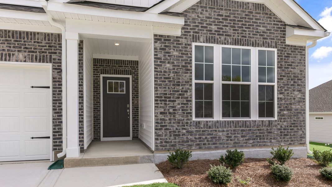 Exterior details and patio area of a home in The Villas at Martin Farms, Aberdeen (Image 3). Exterior details and patio area of a home in The Villas at Martin Farms, Aberdeen (Image 3).