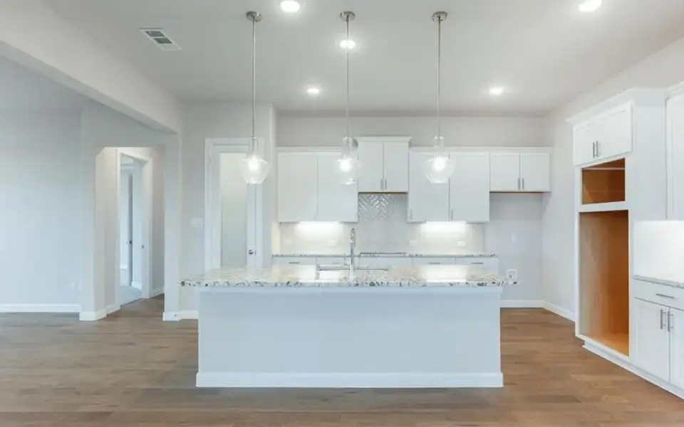 Representative furnished interior of a home built from the Santa Barbara by CastleRock Communities in Lakesong, Grand Prairie (Image 4).