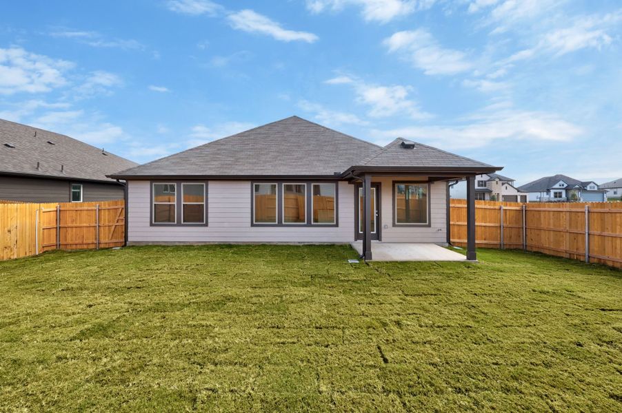 Exterior details and patio area of a home in Prairie Winds, Hutto (Image 3).