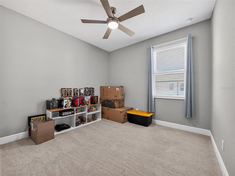 Furnished interior view inside a new home in Shortgrass at Two Rivers, Zephyrhills (Image 13).