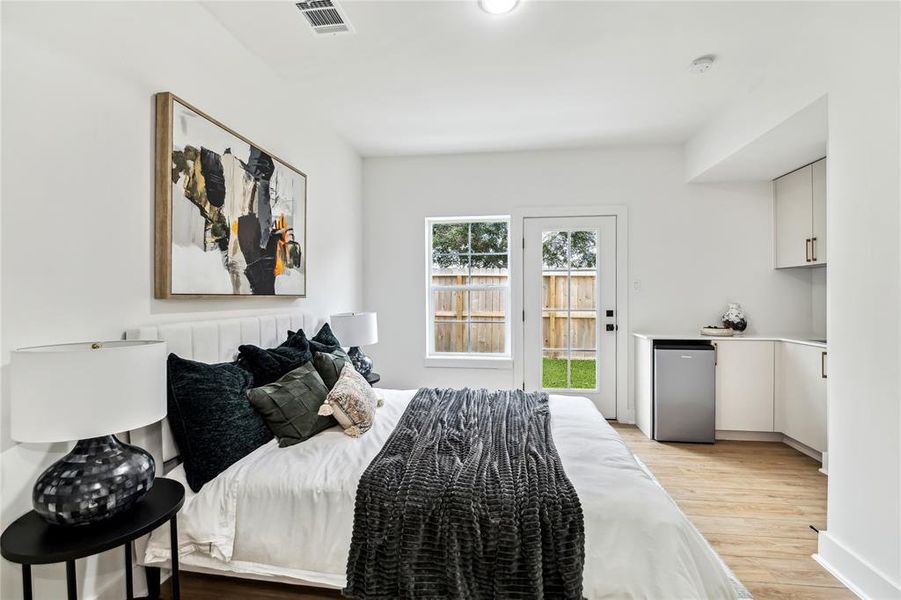 Cozy guest room with kitchenette—perfect for Airbnb or accommodating in-laws.