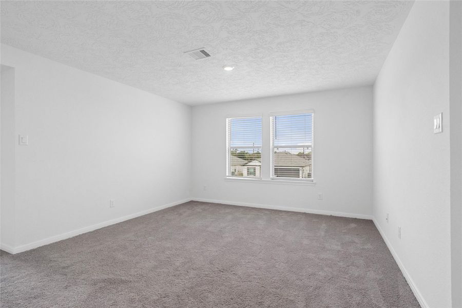 Head upstairs and enjoy the Loft—an additional living area perfect for a game room, media space, or a peaceful retreat.