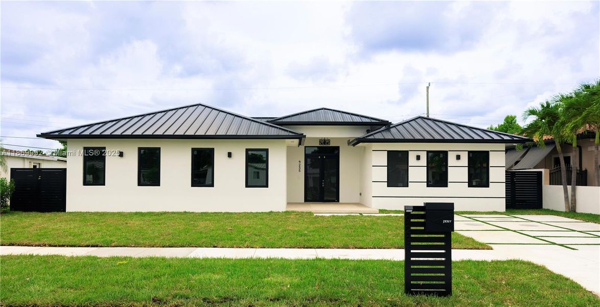 Front exterior of a new home in , Miami, FL, highlighting curb appeal (Image 25).