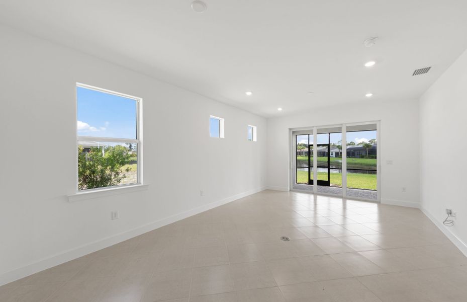Spacious, unfurnished interior of a new home in Del Webb Oak Creek, North Fort Myers (Image 22).