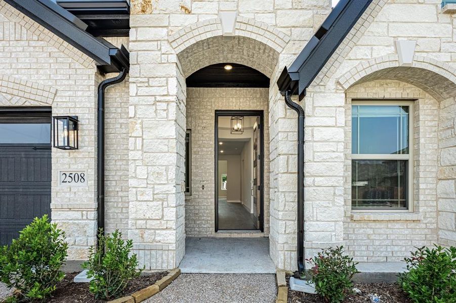 Front exterior of a new home in Legacy Ranch Classic 60, Melissa, TX, highlighting curb appeal (Image 2). Front exterior of a new home in Legacy Ranch Classic 60, Melissa, TX, highlighting curb appeal (Image 2).