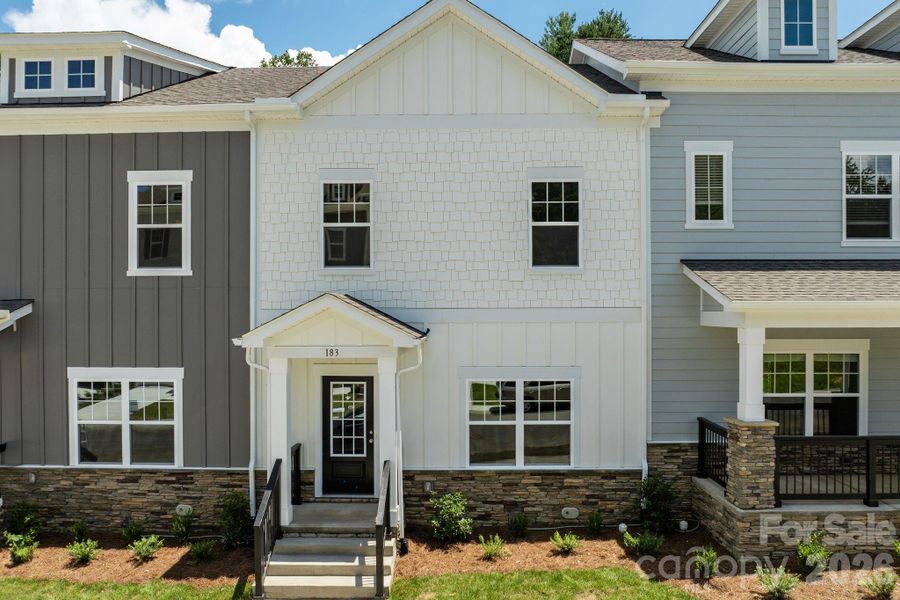 Front exterior of a new home in , Asheville, NC, highlighting curb appeal (Image 1). Front exterior of a new home in , Asheville, NC, highlighting curb appeal (Image 1).