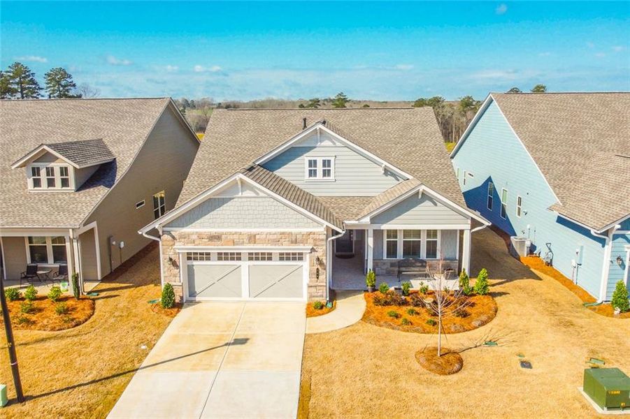 Front exterior of a new home in , Hoschton, GA, highlighting curb appeal (Image 20).
