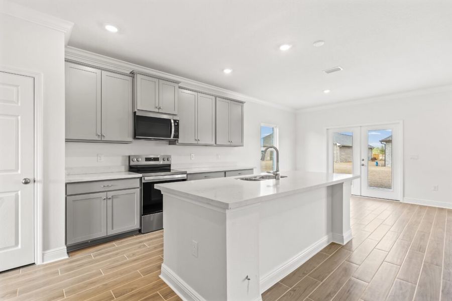 Furnished interior view inside a new home in Natureview, Freeport (Image 10).