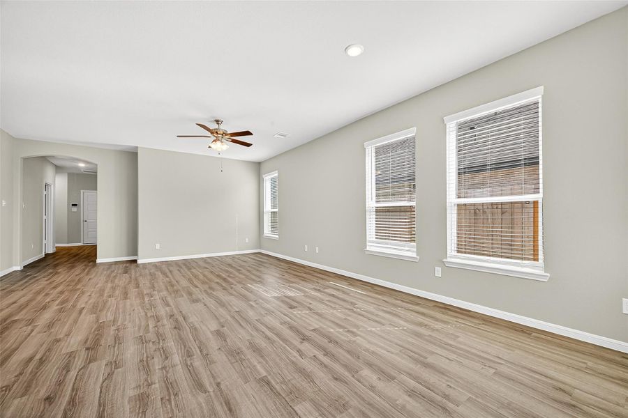 Spacious, unfurnished interior of a new home in Sunterra, Katy (Image 36).