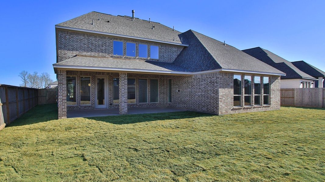 Exterior details and patio area of a home in Riceland, Mont Belvieu (Image 3).