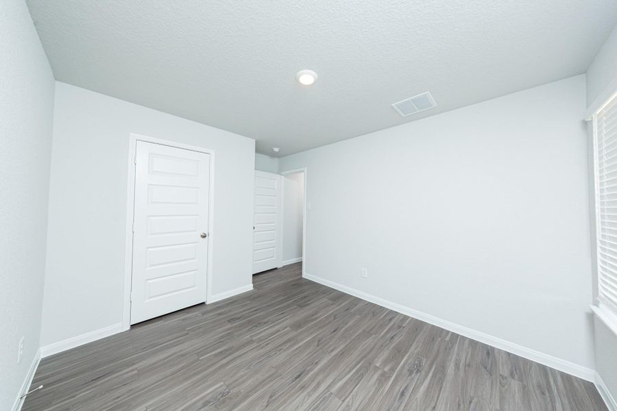 Spacious, unfurnished interior of a new home in River's Edge, Conroe (Image 9). Spacious, unfurnished interior of a new home in River's Edge, Conroe (Image 9).