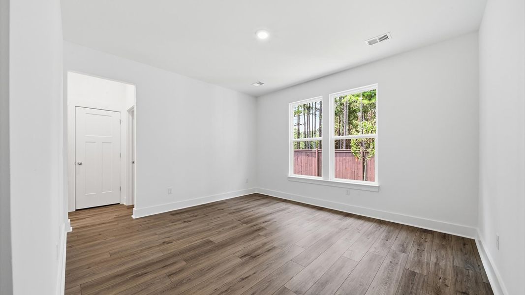 Accomplished design meets restful elegance in this exclusive main level primary suite by DRB Homes Accomplished design meets restful elegance in this exclusive main level primary suite by DRB Homes
