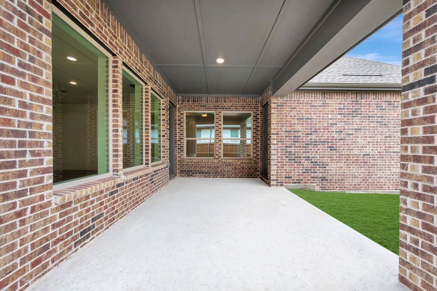 Exterior details and patio area of a home in Elements at Viridian - Signature Series, Arlington (Image 3). Exterior details and patio area of a home in Elements at Viridian - Signature Series, Arlington (Image 3).
