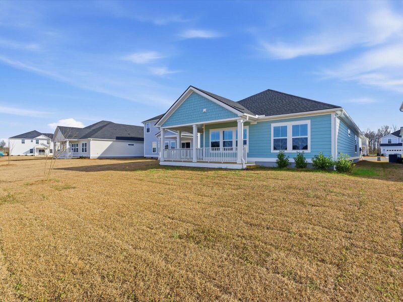 Exterior details and patio area of a home in The Coves at Lakes of Cane Bay, Summerville (Image 31).