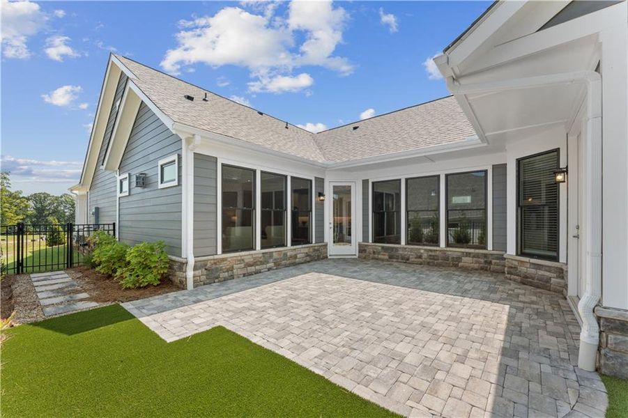 Exterior details and patio area of a home in The Courtyards at Post Road, Cumming (Image 23).