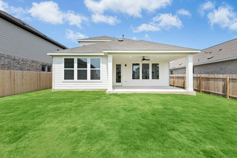 Exterior details and patio area of a home in Santa Rita Ranch, Liberty Hill (Image 20).
