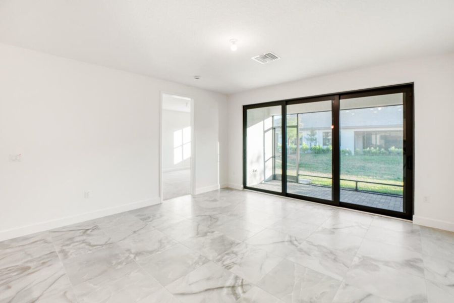 Living room view to screened patio
