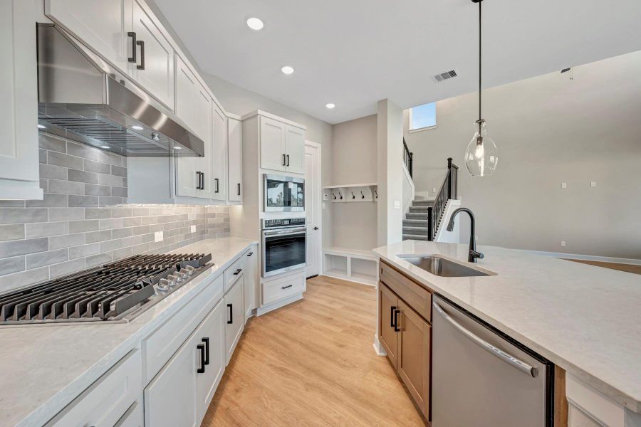 Furnished interior view inside a new home in COLTON - Reserve Collection, Todd Mission (Image 27).