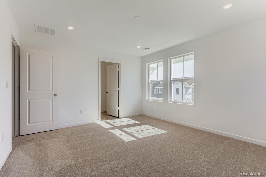 Spacious, unfurnished interior of a new home in Parterre: The Skyline Collection, Thornton (Image 12).