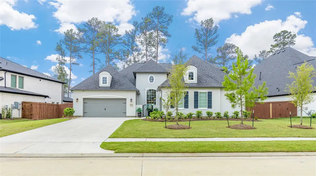 Front exterior of a new home in , Conroe, TX, highlighting curb appeal (Image 2). Front exterior of a new home in , Conroe, TX, highlighting curb appeal (Image 2).