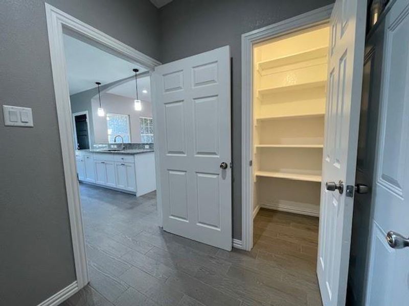Second pantry or storage area in utility room Second pantry or storage area in utility room
