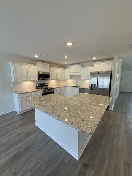 Furnished interior view inside a new home in Legacy Fields, Pleasant View (Image 5).