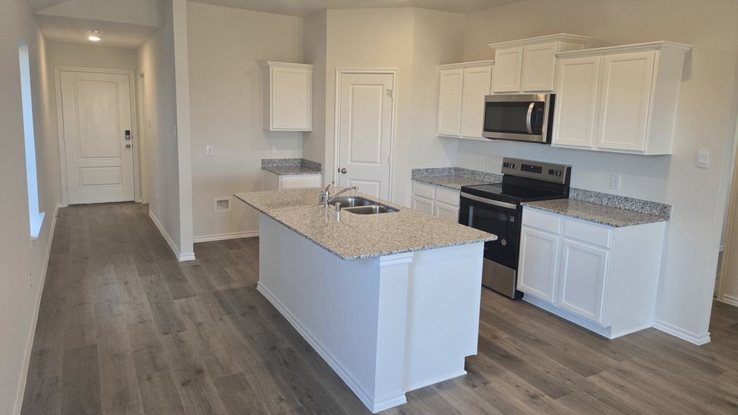 Furnished interior view inside a new home in Hanolley Hills, Sherman (Image 3).