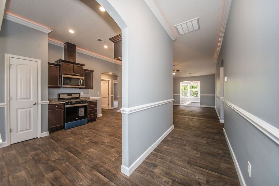 Representative unfurnished interior of a home built from the Jackson by Enchanted Homes in Lonesome Dove, San Antonio (Image 22).