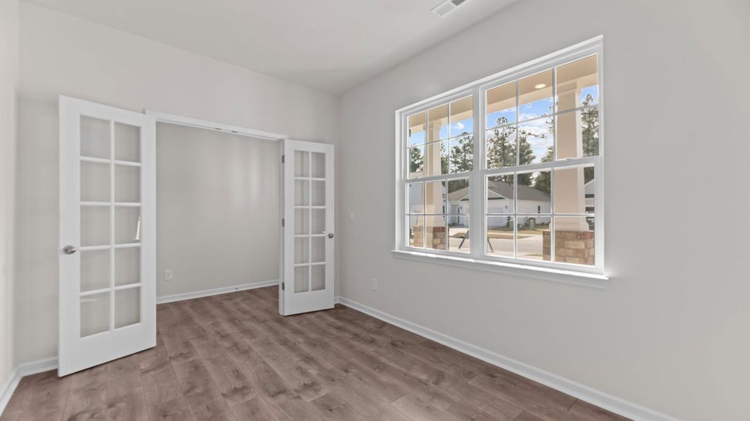 Spacious, unfurnished interior of a new home in East Ridge, Ayden (Image 12).