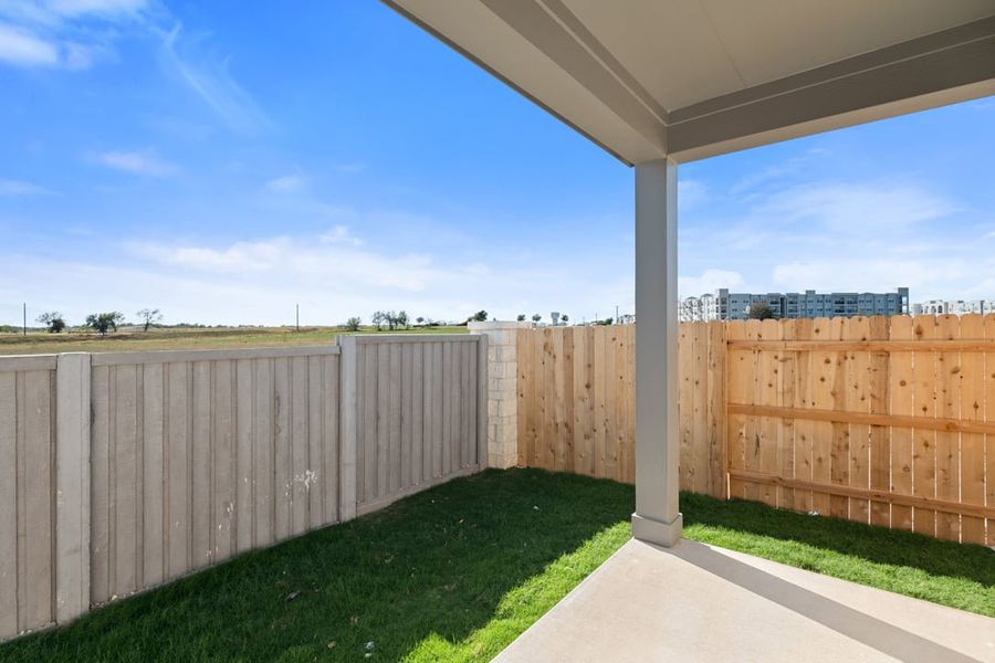 Exterior details and patio area of a home in Union Collection at Park Central, Georgetown (Image 4).