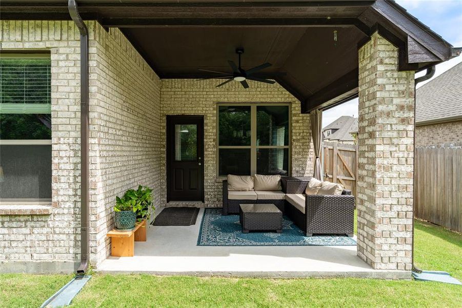 Covered patio for cookouts and relaxing.