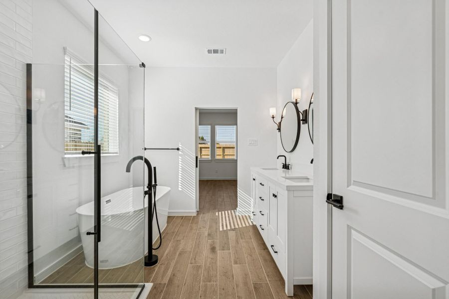 Luxurious primary bath (*Photo not of actual home and used for illustration purposes only.)